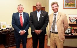 MLA Hansen, left, with Minister of State Joseph Harmon, center, and British High Commissioner to Guyana, Mr. Gregory Quinn.