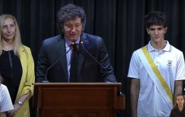 Speaking about Communism always brings on problems, the president joked as two students fainted during his appearance at the Catholic school he and his sister attended