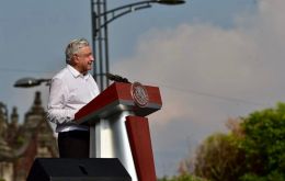 On Sunday onlookers shook hands and took selfies with the president in Mexico City. Many with flags of the ruling National Regeneration Movement (Morena)