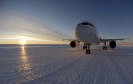 Charlton Clark(L) and Dr Jeremy Smith stand by the first Airbus A319 passenger jet to land in Antarctica