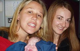 Dr Jenny Cook, right, with new mother Aline and baby Barbara delivered at 10,000m.