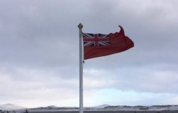 The Red Ensign flying in windy Falkland Islands 