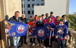 Mayor Radonich and Honorary British consul John Rees with members of the Falklands hockey delegation