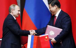 Presidents Putin and Xi Jinping in Beijing when the final agreement was announced 