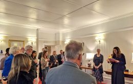 During the celebration at Government House, Governor Blake listens to one of the speeches