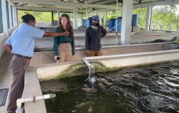 MLA Teslyn Barkman at an aquaculture unit from the Ministry of Agriculture 