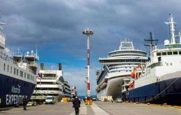 The port of Ushuaia with several cruise vessels docked 